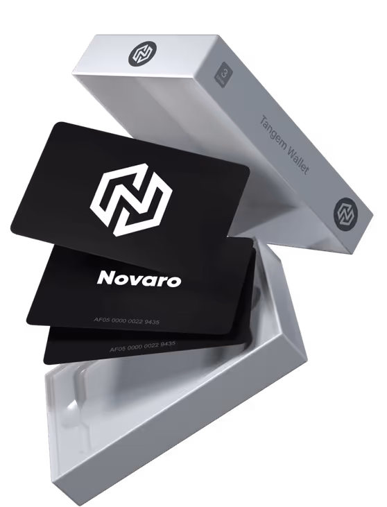 Novaro x Tangem Wallet: two black NFC cards with the Novaro logo in a silver Tangem box